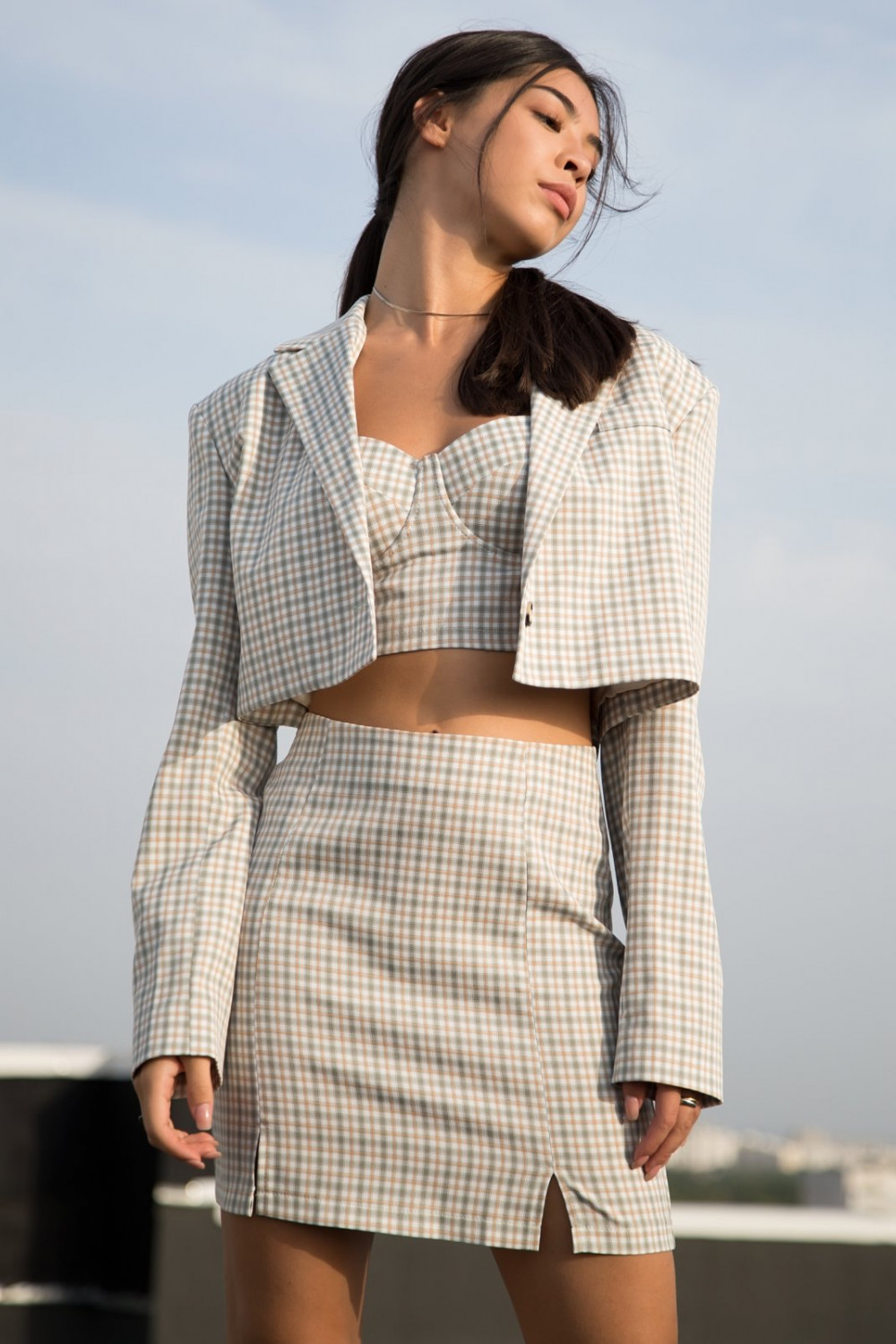 Torero suit with a check skirt